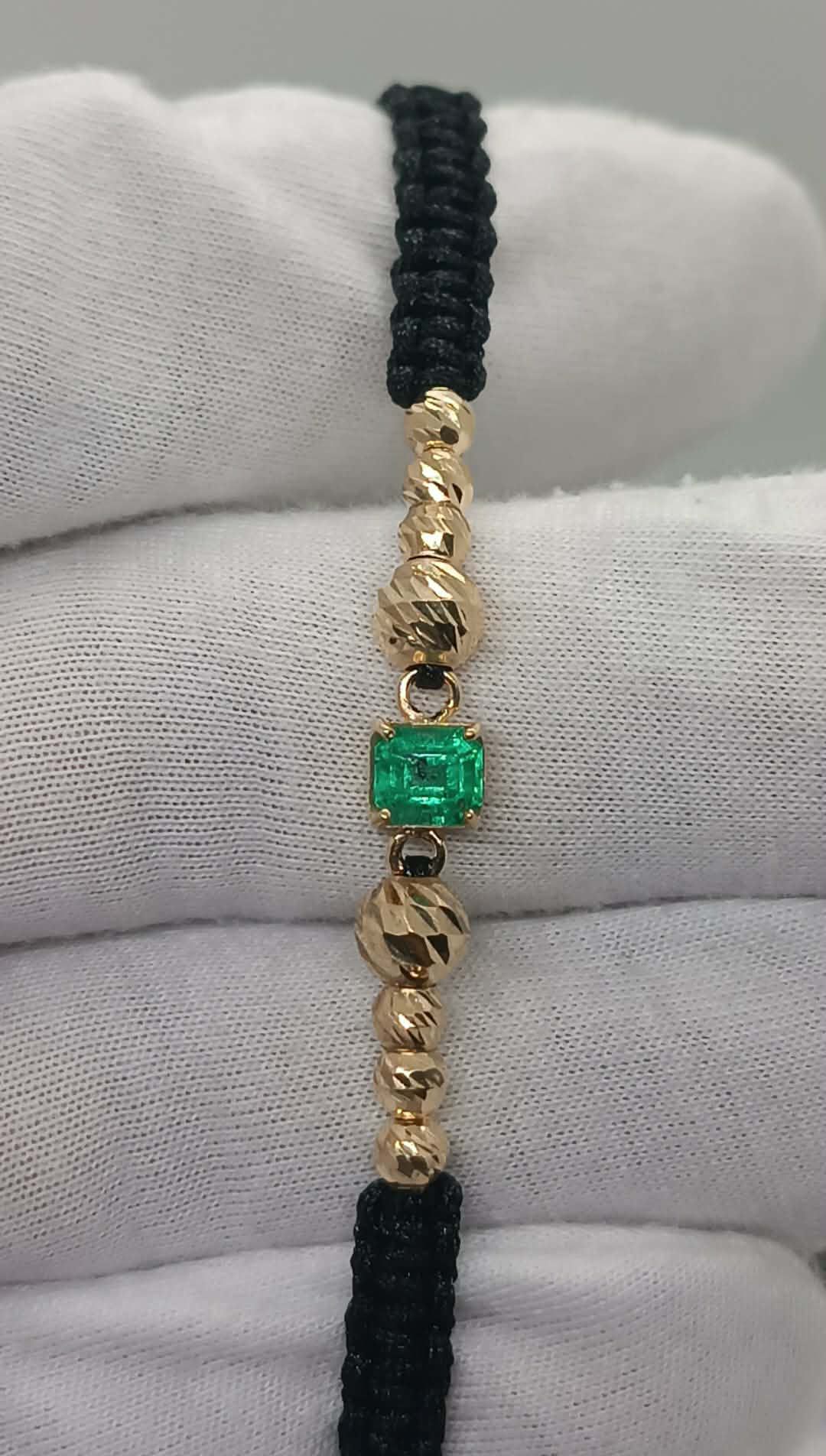 Emerald earrings on marble